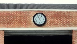 The depot clock and roller door above the front entrance
