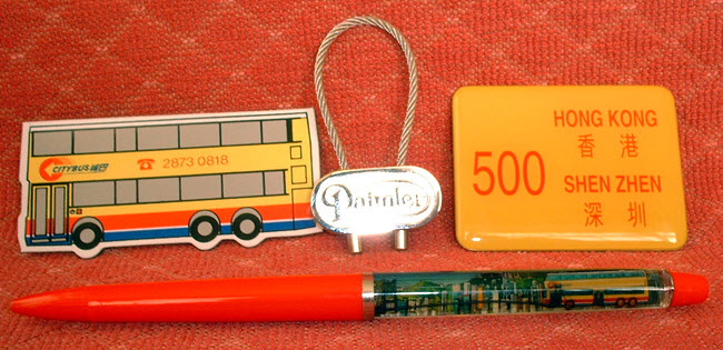 Set 19906(A) - Extras - Fridge magnets, Key Chain and Pen.